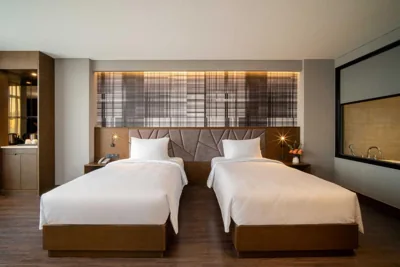 Twinkamer met stadszicht — Nhat Ha Lavish Hotel